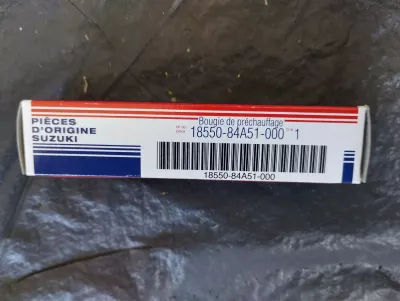 Original SUZUKI GLÜHKERZE. 4 PCS Nr: 1855084A51000