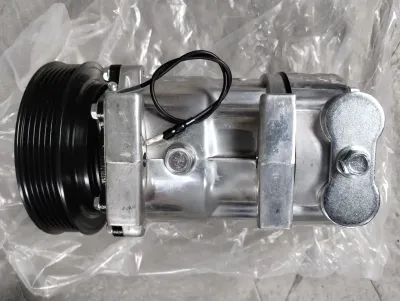Neuer Klimakompressor für Saab 9000 (1996–98). 