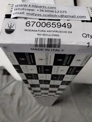 Genuine Maserati RH Moulding. Part number 670065949, 670142159.