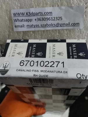 Genuine Maserati RH GUIDE DOOR TRIM. Part number 670102271, 670142157.