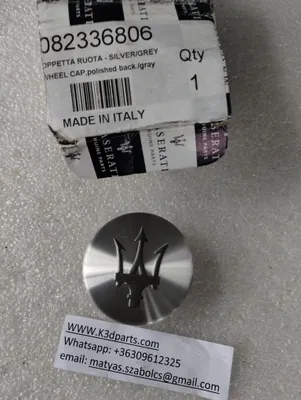 Genuine Maserati Wheel Cap With Shield Chrome. Part number 82336806.