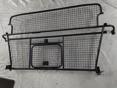 Genuine Land Rover Dog Guard. Part number VUB502080.
