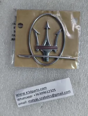 Genuine Maserati emblem LH. Part number 88639700.