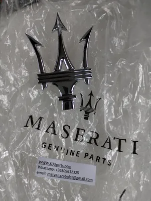 Genuine Maserati TRIDENT EMBLEM FOR RADIATOR GRILLE. Part number Left 670005377.